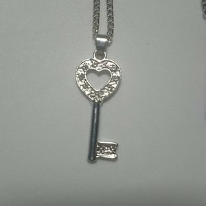 Silver necklace key